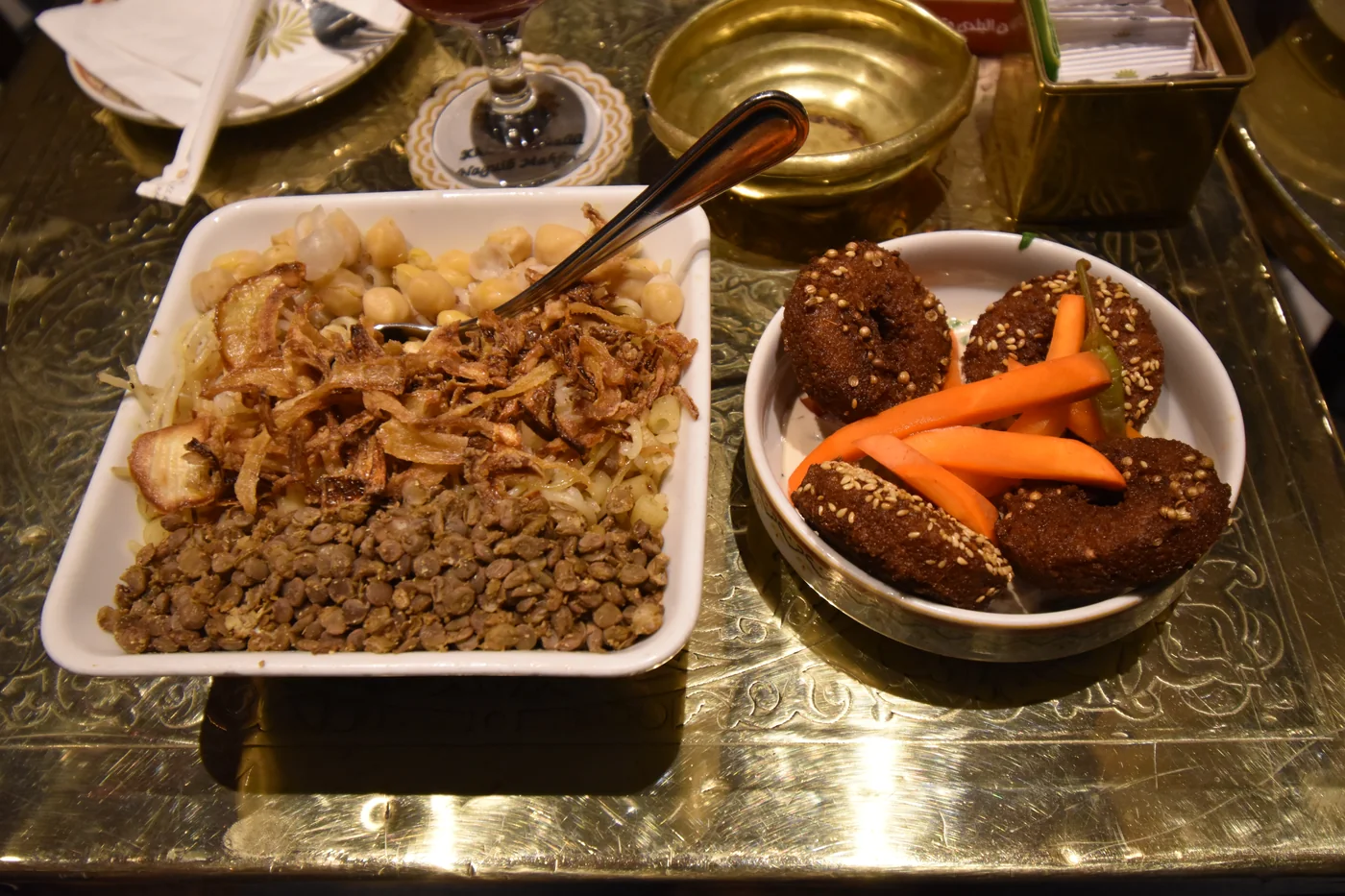Koshary and falafel served on a Cairo café table
